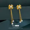 Brincos Longos com Borla de Pérola e Laço Recortados Borboleta Banhados a Ouro Imitação 14K Presilhas de Orelha High-End