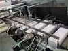 El fabricante se especializa en producir la línea de ensamblaje de empaque totalmente automática ZH100 máquina de enfriamiento y pegado de cajas