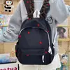 Nova mochila escolar para meninas, mochila com bordado de coração, grande capacidade, alto apelo estético, adequada para alunos do ensino fundamental, médio e médio