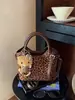 Bolso de Mano de Alta Gama Transfronterizo para Mujer, Bolso de Hombro Cruzado Trendy de Calle para Compras y Viajes, Bolso Cubo Retro de Mano