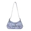 Bolso de mano de moda transfronterizo para mujer, nuevo modelo verano 2026, bolso de hombro con decoración de cinturón, bolso versátil para el antebrazo