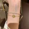 "Diosa del Sol" Pulsera Dorada Retro Brújula Estilo Palacio, Joyería de Nicho Exquisita de Gama Alta Simple y Elegante que Realza el Cutis