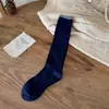 Tacto Súper Suave 2025 Otoño e Invierno Nuevos Calcetines de Lana Cálida de Color Sólido para Mujer Tipo JK Holgados de Tubo Largo Venta al por Mayor