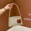 Moda para Viajes Retro Casual Verano 2026 Nuevo Estilo Colgante Casual Simple Gran Capacidad Portátil al Hombro Bolso Cuadrado Pequeño