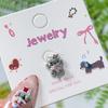 Nuevos Aretes de Dibujos Animados de Kt Oreja de Gato Hueso Uñas Lindos Goteo de Aceite Kawaii Aretes Acero de Titanio Modernos Elegantes