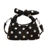 Bolso de lunares de nicho súper popular para mujer, nuevo estilo coreano 2026, bolso versátil y elegante para hombro y bandolera para ir al trabajo y viajar