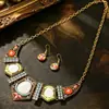 Aretes y Collar de Nuevo Estilo Transfronterizo Europeo y Americano para Mujer, Joyería Floral con Incrustaciones de Diamante de Aleación, Cadena de Suéter Exagerada Europea y Americana al por Mayor