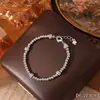 Pulseira Popular Exquisita de Zircônia Flor de Cerejeira para Mulheres no Tiktok, Galvanizada a Ouro Real, Joia da Moda de Luxo Leve de Nicho de Alta Qualidade