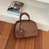 2026 Nova Bolsa com Senso de Design Outono Versátil Bolsa de Mão de Luxo Leve para Mulheres Bolsa Transversal para Mulheres Tendência