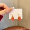Pendientes festivos de Año Nuevo rojos, pendientes de año de nacimiento de dragón femenino, pendientes de diseño de nicho de alto sentido, pendientes de Año Nuevo de otoño e invierno