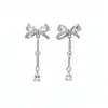 Pendientes de perla con lazo de circón y aguja de plata, elegantes y de moda, versátiles para ir al trabajo, sensación de lujo ligero y alta gama, pendientes al por mayor