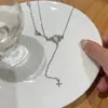 Elegante colar de borla em forma de coração para mulheres design de nicho corrente de suéter de alta qualidade doce fresco estilo frio Corrente de clavícula de opala