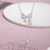 Colar com Pingente de Zircônia em Forma de Laço e Franjas para Mulheres Verão Luxo Leve Nicho Temperamento com Estrela Super Brilhante Nova Tendência Corrente para Clavícula