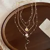 Collar de Perlas de Múltiples Capas con Colgante de Flor de Concha Estilo Resort Costero Transfronterizo Europeo y Americano Cadena para Clavícula de Lujo Ligero y de Alta Gama para Mujeres