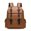Mochila de couro PU macio estilo retrô britânico Amazon transfronteiriça, casual, grande capacidade, adequada para passeios e viagens, com fivela de cinto