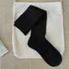 Calcetines de Nuevo Estilo Otoño Temprano 2026 para Mujer Color Sólido Avena Café Algodón Transpirable Estilo Coreano Calcetines para Mujer Calcetines de Media Pantorrilla Texturizados