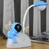 Nova Luminária de Mesa Pequena de Astronauta para Quarto de Estudante LED para Cabeceira Luz Noturna Criativa Luminária de Mesa Pequena de Astronauta para Desktop