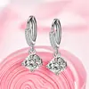 Yihua AliExpress pendientes de comercio exterior joyería al por mayor pendientes de un solo taladro de cuatro garras fábrica directa una generación de cabello