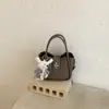 Bolsa feminina transfronteiriça 2026 de alta qualidade, bolsa de mão tipo cesta, bolsa saco, bolsa de ombro e transversal versátil e da moda