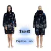 Ropa de invierno de franela con capucha de dibujos animados transfronteriza para adultos, grosor aumentado para hombres y mujeres, ropa perezosa para parejas, venta al por mayor