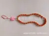 Nueva cadena de móvil bohemia colorida de cuentas de arroz y cristal, colgante de cuerda, cadena de móvil con letra personalizada