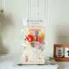Buquê de Girassol Tricotado para o Dia dos Professores Transfronteiriço, Presente de Flor Artificial de Lã, Lembrança de Flor Preservada de Acrílico Atacado