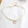 Joyería estilo hada accesorios para niña colgante de corazón de durazno con diamante cadena para el cuello gargantilla corta cadena para clavícula collar de perlas