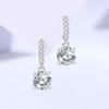 Aretes redondos de cuatro garras de plata esterlina s925 Damila para mujer, moda versátil, aretes de circonita de lujo ligero con aretes de diamantes al por mayor