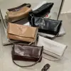 Bolsa feminina vintage de alta qualidade 2026 nova popular versátil bolsa transversal com corrente bolsa de ombro tote de grande capacidade
