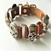 Pulsera de cuero con remaches punk europeo y americano, pulsera de cuero de vaca con aleación atmosférica y calavera retro para hombre.