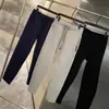 ¡Estilo de pierna cónica! ¡Tejido Toray de capa de aire! Bolsillos con cremallera color liso de moda versátiles pantalones casuales pantalones de chándal pantalones para hombre