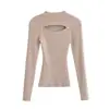 Top de punto retro sexy con huecos, cuello semi-alto, corte ajustado, primavera 2026, diseño único, top elegante y a la moda