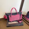Bolso de mano a cuadros color block estilo workwear, diseño retro de patchwork naranja y verde, versátil para viajar y uso casual, bolso de hombro