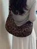 Bolsa de albóndiga casual retro con estampado de leopardo para mujer, nuevo bolso de hombro de gamuza para otoño e invierno 2026, bolso cruzado de gran capacidad para el día a día