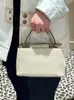Bolsa tote Guangzhou de alta qualidade da série TB Bitten, novo modelo em couro bovino texturizado, minibolsa