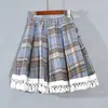 Falda Corta JK a Cuadros para Mujer Otoño e Invierno 2024 Nuevo Estilo Falda Larga de Lana Pequeña con Forma de A Falda Gruesa de Otoño