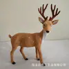 Animal de simulación ciervo sika simulación alce jirafa modelo animal de piel accesorios de decoración para cine y televisión venta al por mayor