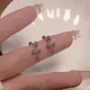 Nuevo mini pequeño serpiente de espíritu clavo de oreja hebilla de tornillo clavo de hueso de oreja accesorios para orejas diseño de nicho pendientes diamante verde lujo ligero venta al por mayor