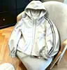 Chamarra con capucha deportiva casual nueva para mujer 2026, corte holgado, versátil, estilo corto, chamarra, prenda de abrigo