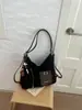 Bolsa Feminina Versátil de Camurça Vintage 2025 Nova Bolsa de Ombro para o Trabalho Grande Capacidade Bolsa Tote Transversal Venda por Atacado