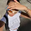 Verano 2023 Ropa de mujer transfronteriza europea y americana moda callejera camiseta corta ajustada con estampado de diamantes para usar como outer wear ins