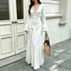 Vestido de punto de moda estilo francés con mangas acampanadas para mujer, otoño e invierno 2026, diseño de alta gama con patchwork de encaje, falda larga de línea A