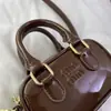 Bolsa de Bowling Boston Feminina 2025 Primavera e Verão Nova Casual Versátil Carta Ombro Transversal Bolsa Infantil