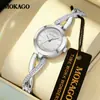 Mokago relógio feminino versátil temperamento mostrador madrepérola pulseira de metal relógio incrustado com strass formato de coração moderno relógio de quartzo atacado