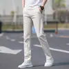 Pantalones casuales rectos de color blanco roto para hombre, nuevo modelo primavera y otoño 2026, pantalones de hombre de alta gama, corte slim, suaves
