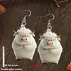 Nuevos aretes acrílicos transfronterizos con una gallina poniendo huevos, con un divertido diseño de caricatura, únicos y versátiles