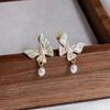 Dulce chica súper hada aguja de plata S925 aretes vintage de mariposa sueño púrpura aretes de temperamento de perla de agua dulce suave