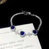 Pulseira com fecho de flor redonda de zircônia, luxo leve, alta qualidade, pulseira requintada com design estiloso, versátil e fashion, atacado