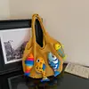 Bolsa de tricô de grande capacidade para mulheres, novo design moderno de 2026, estilo nicho, bolsa de ombro versátil, casual e leve, perfeita para carregar no antebraço