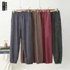 Nuevos estilos de otoño e invierno: Pantalones jogger de cuadros para mujer, cálidos, forrados de polar, de tiro alto, adecuados para madres de mediana edad, y se pueden usar como ropa exterior